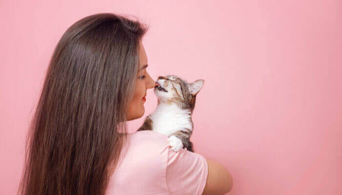 Why does my cat lick me and not my husband?